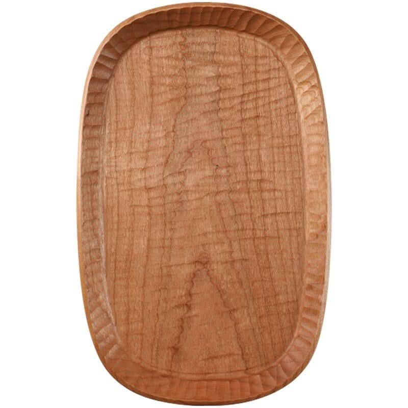Carved wooden coffee tray with rustic texture, perfect for farmhouse decor.